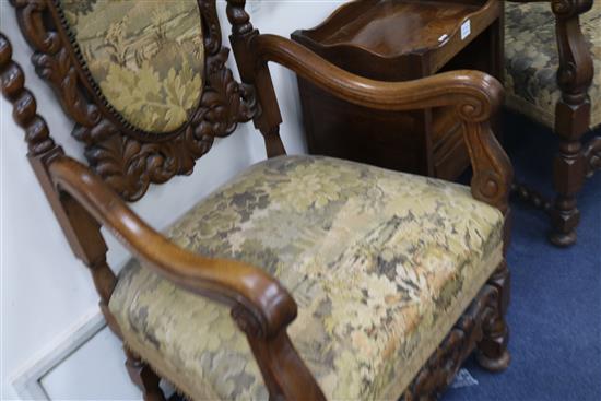 A pair of late 19th century German oak schloss chairs